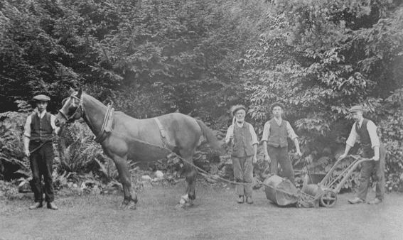 Mowing the lawn at Bury Hill, c1910 Image: Dorking Museum